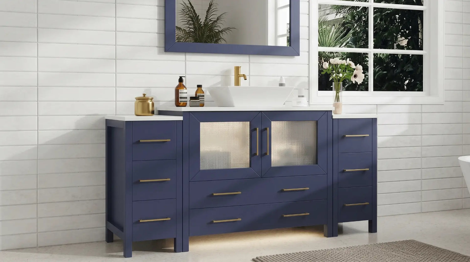 A modern luxury bathroom featuring a vessel sink vanity with an above-counter basin